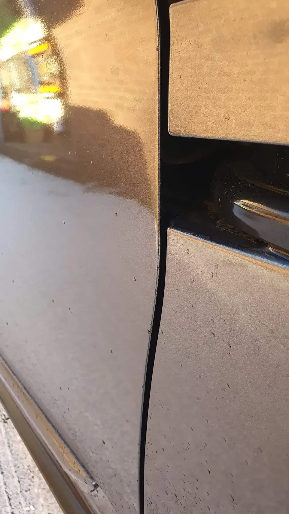 After: dented car door before and after repair